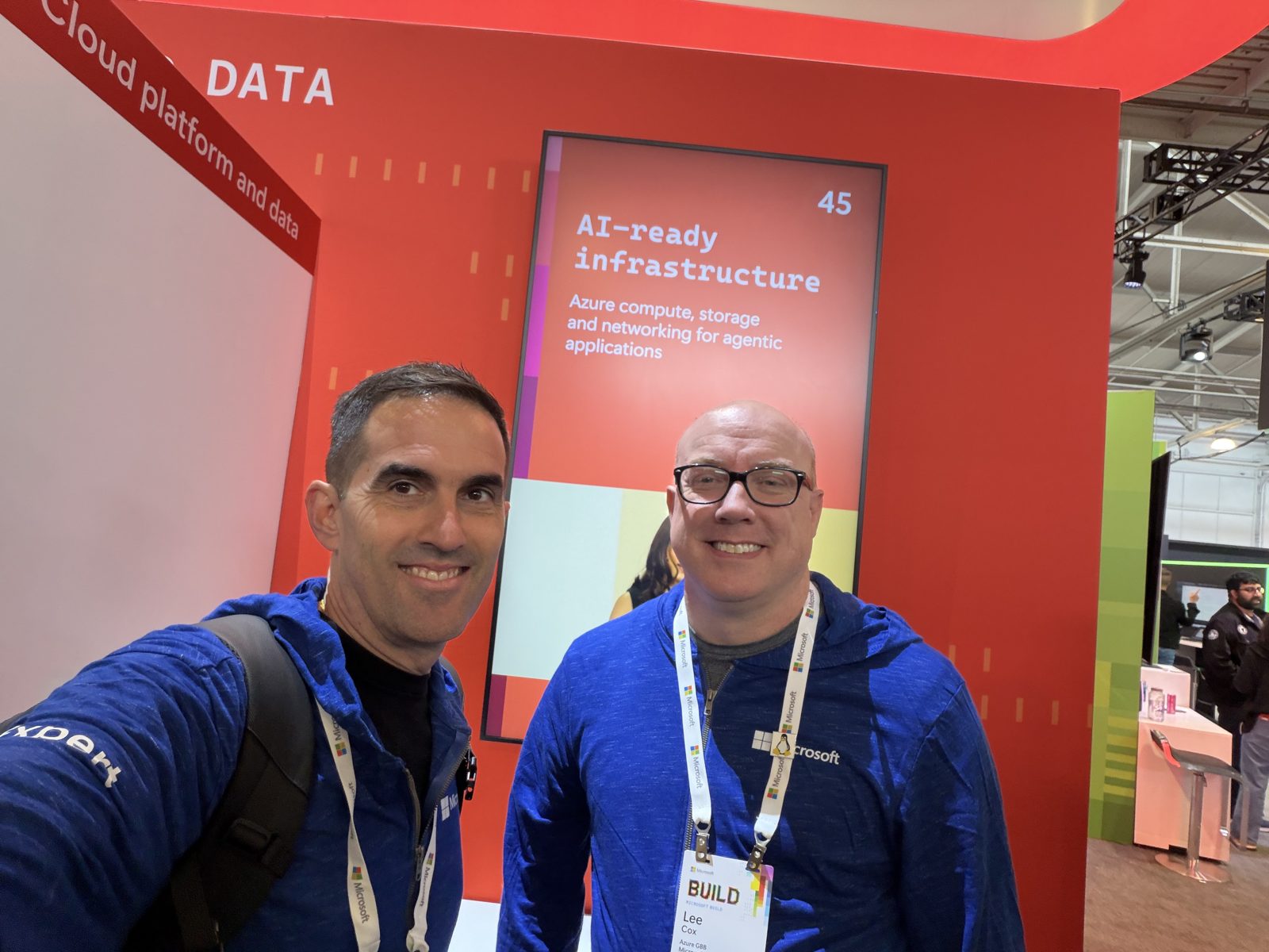 Lee and Carlos smiling at the Azure Linux booth on the Build showroom floor